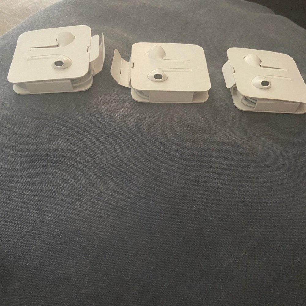 3 pair Apple earbuds.